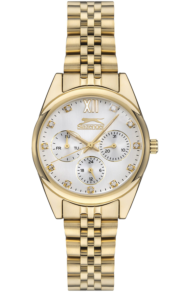 Γυναικείο ρολόι Slazenger διαμέτρου 34mm με μηχανισμό Quartz. Έχει κάσα σε χρυσό χρώμα και καντράν σε λευκό χρώμα. Έχει ένδειξη διπλής ώρας, ημερομηνίας και ημέρας. SL.09.6541.4.05
