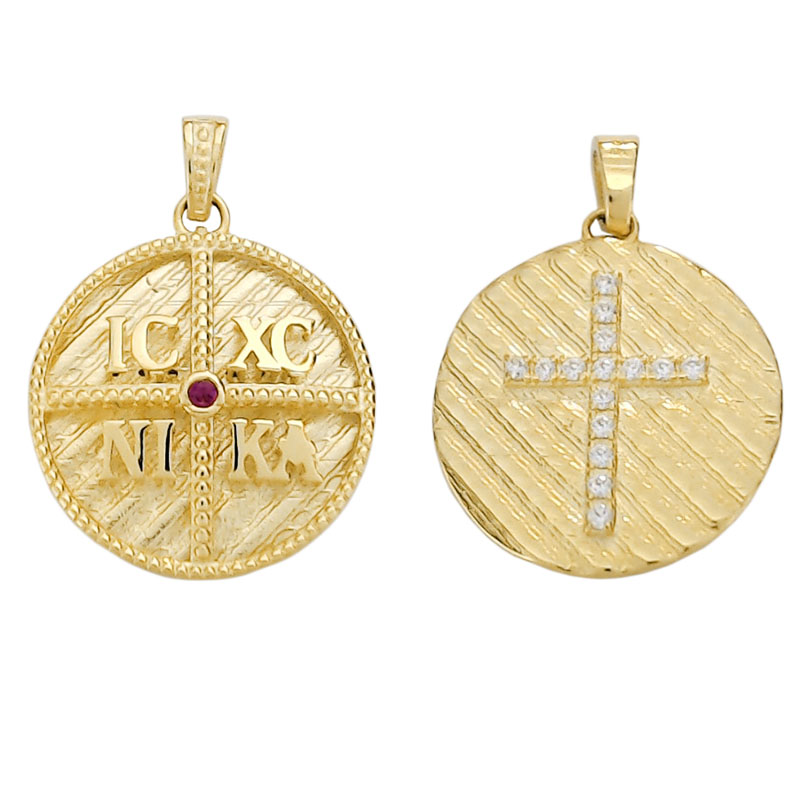 Χρυσά κρεμαστά σκουλαρίκια από κίτρινο χρυσό 14 καρατίων με ένα λευκό μονοπετράκι από ζιργκόν. Στο κάτω μέρος τους υπάρχει ένα κρικάκι με λευκά ζιργκόν που πιάνει στο πάνω μέρος του αυτιού. Μενταγιόν Κωνσταντινάτο κόκκινη πέτρα Κ14